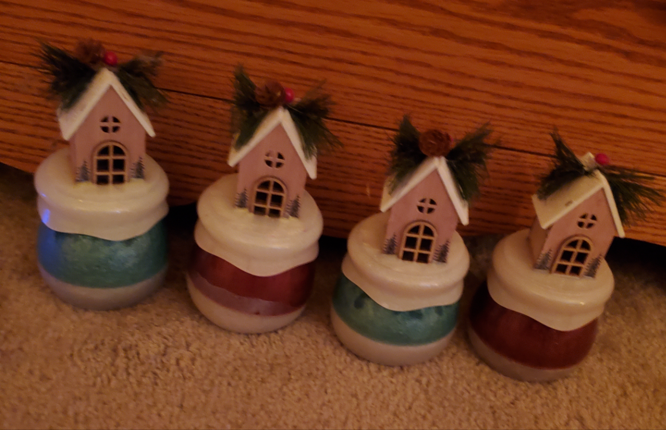 Set of four Christmas themed jars with removable lids