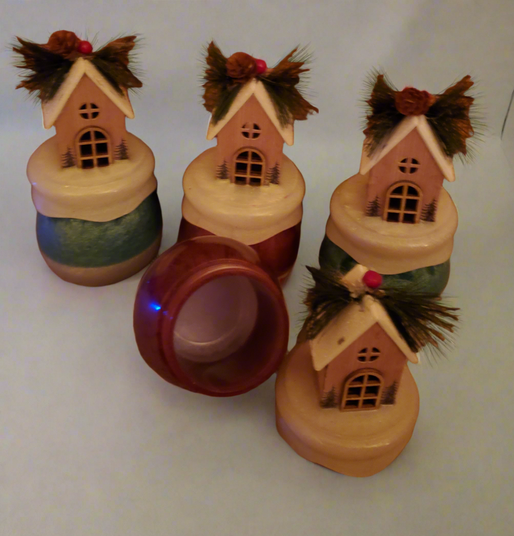 Set of four Christmas themed jars with removable lids