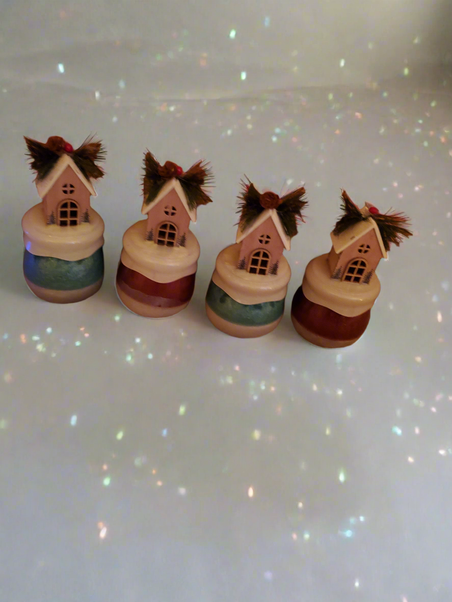 Set of four Christmas themed jars with removable lids