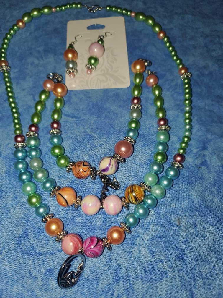 Handmade beaded jewelry set. 4 piece set - necklace, anklet, bracelet and earrings.