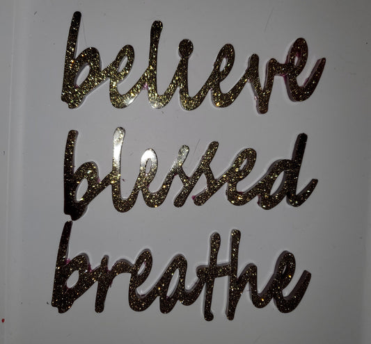 Inspirational signs - believe, breathe, blessed. Resin, deep red and glittery gold.