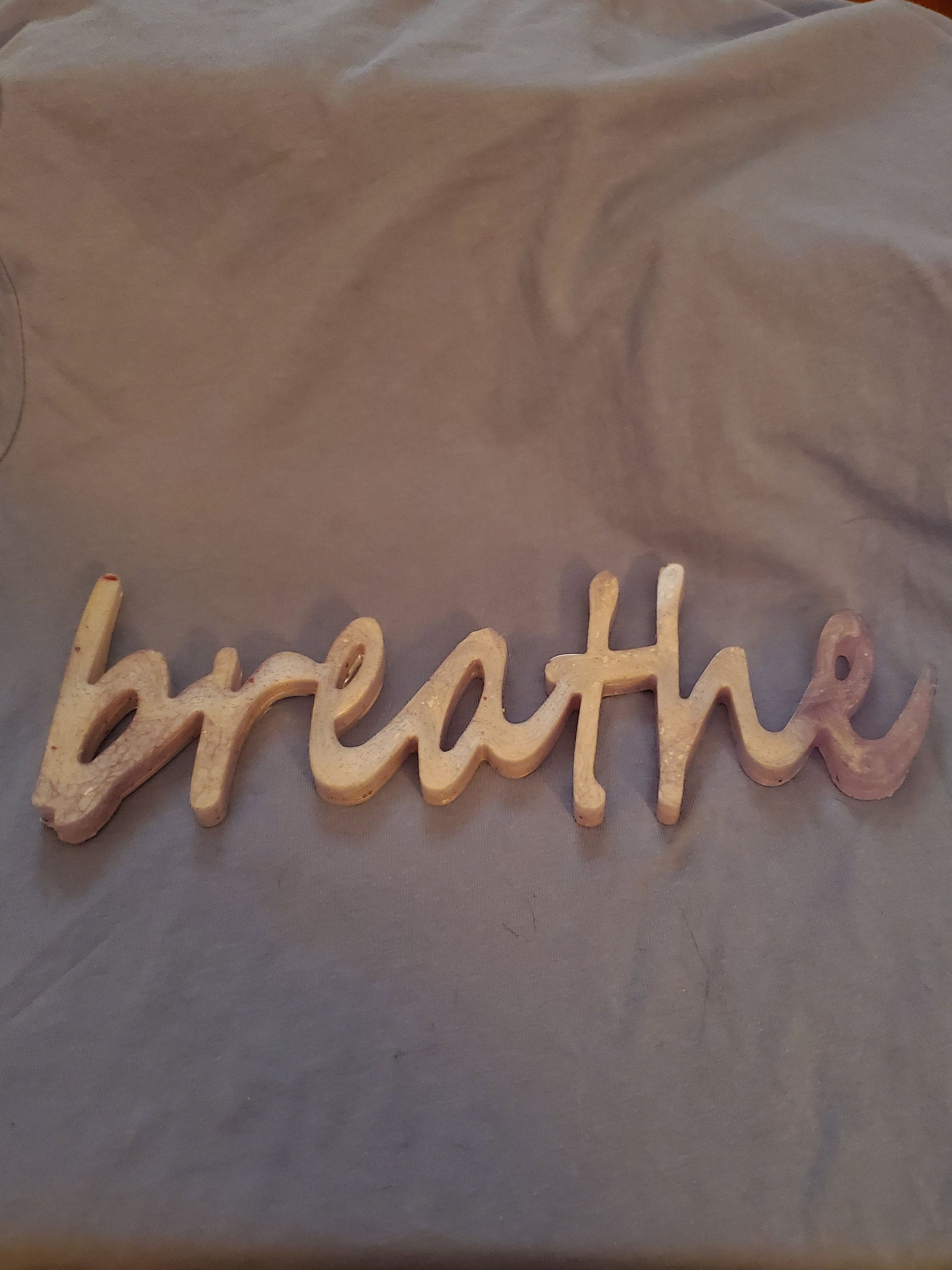 Inspirational signs... "Blessed," "Believe," "Breathe." Resin signs. Written in cursive