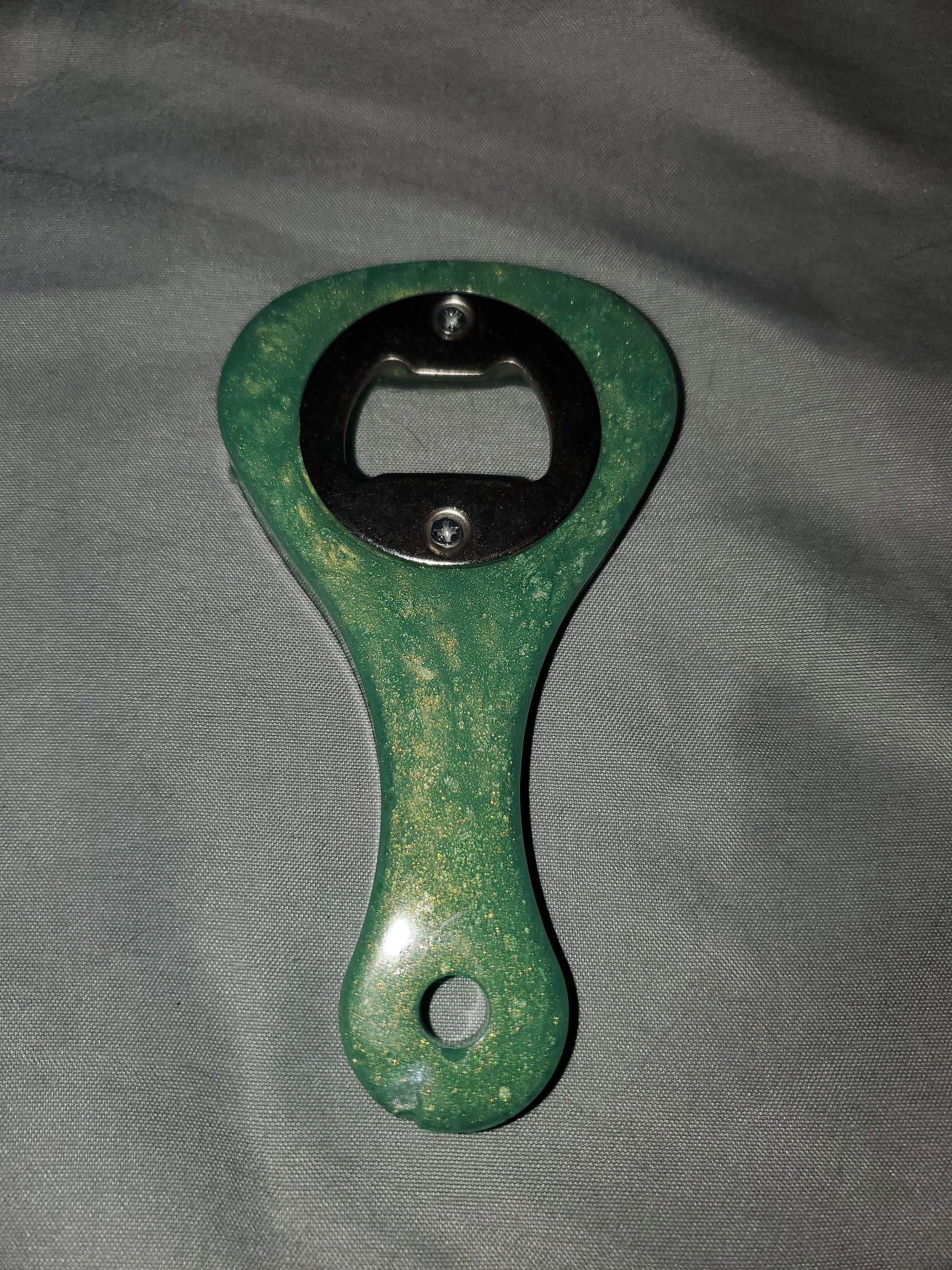 Beer bottle opener/bottle opener. Epoxy resin based, durable and one-of-a-kind!