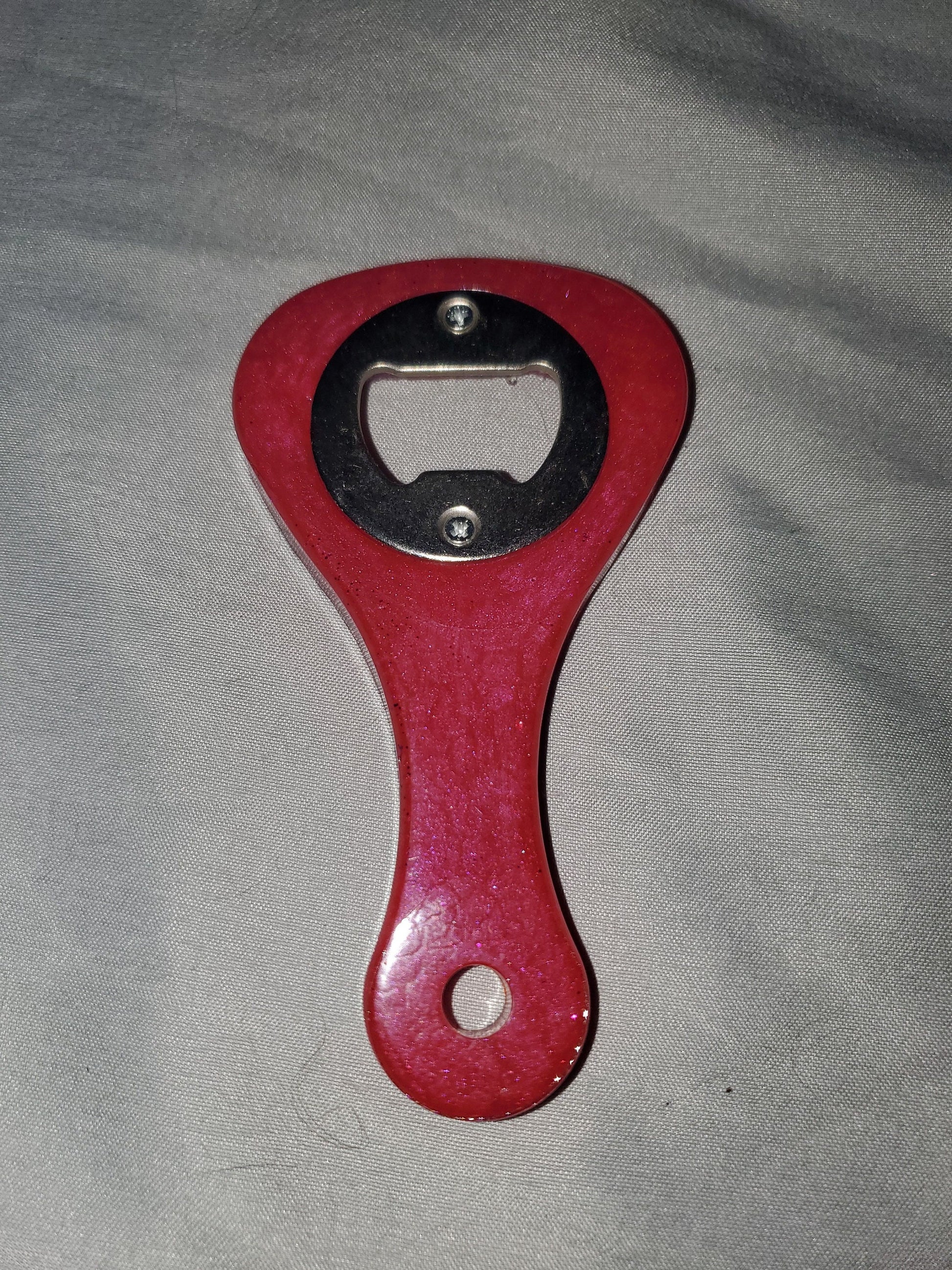 Beer bottle opener/bottle opener. Epoxy resin based, durable and one-of-a-kind!