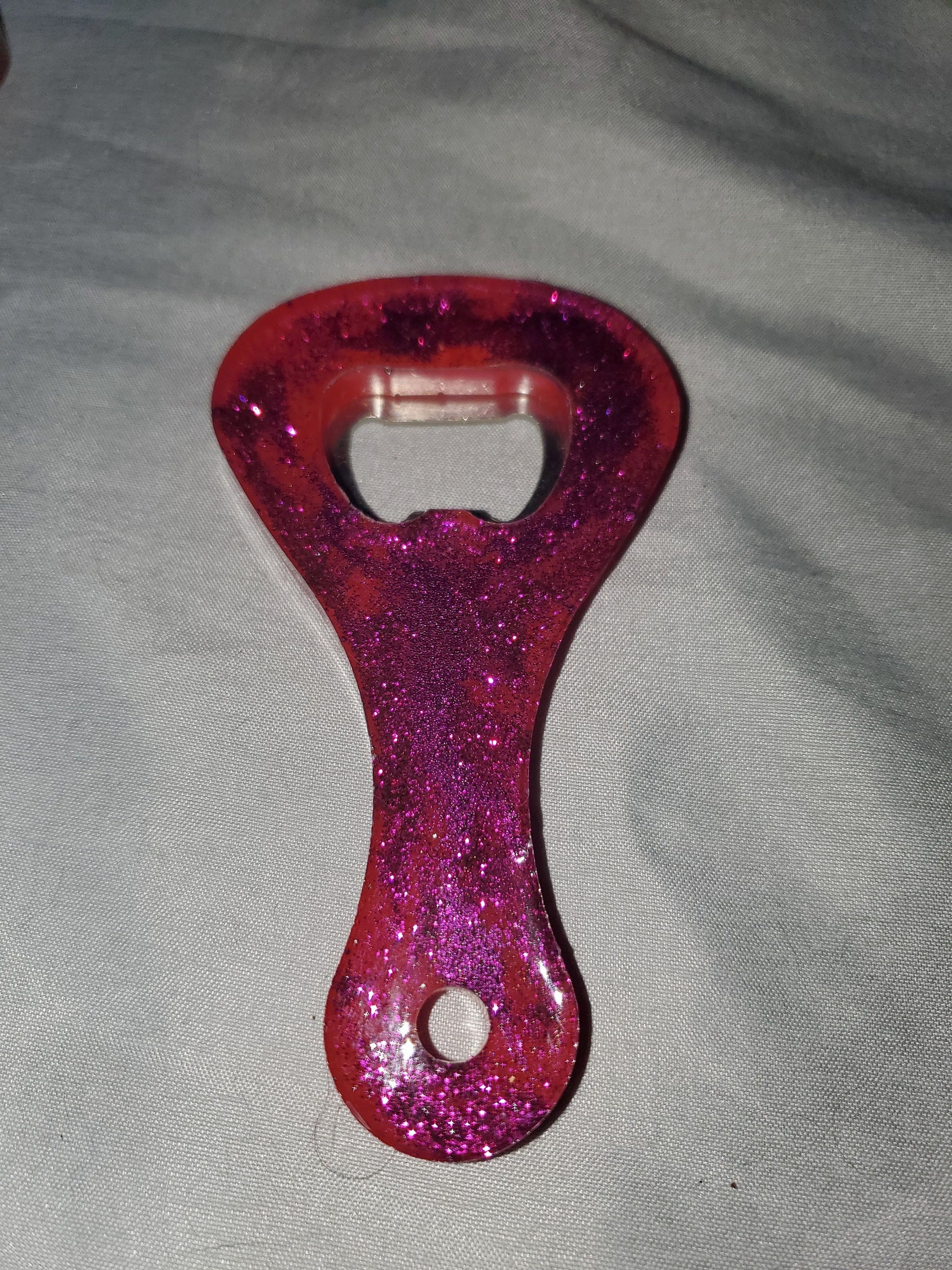 Beer bottle opener/bottle opener. Epoxy resin based, durable and one-of-a-kind!