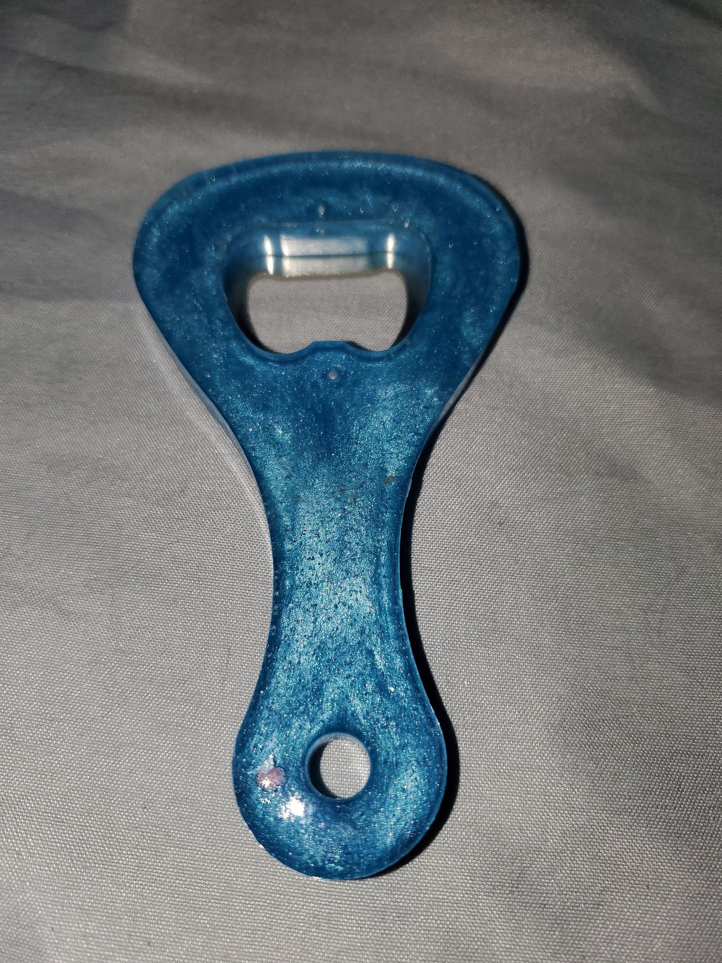 Beer bottle opener/bottle opener. Epoxy resin based, durable and one-of-a-kind!